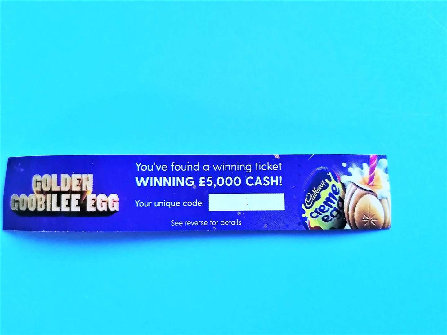 The winning ticket found under the Creme Egg's wrapper. Its unique code has been removed.