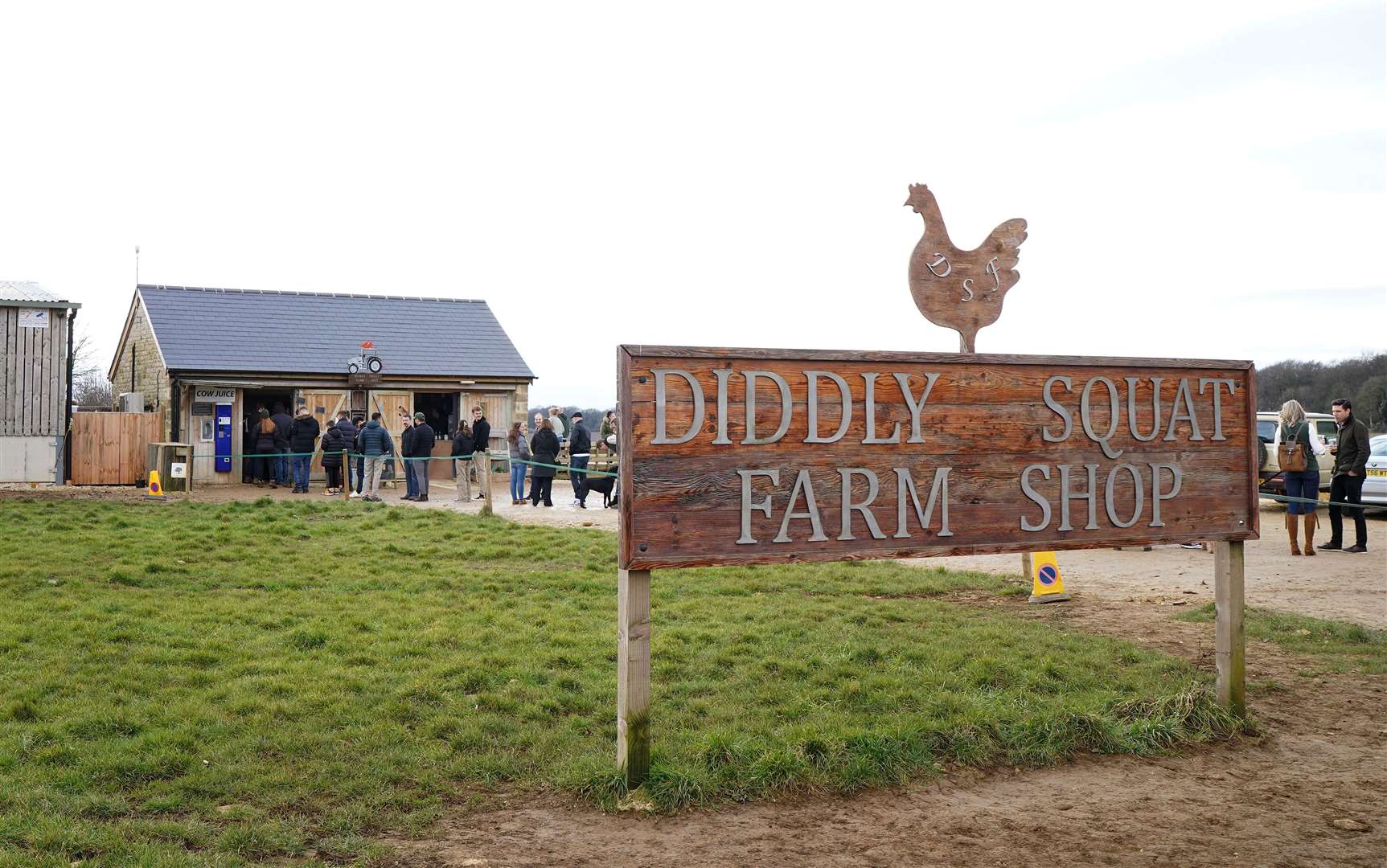 Customers queue to get into Jeremy Clarkson’s Diddly Squat Farm Shop near Chadlington (Gareth Fuller/PA)