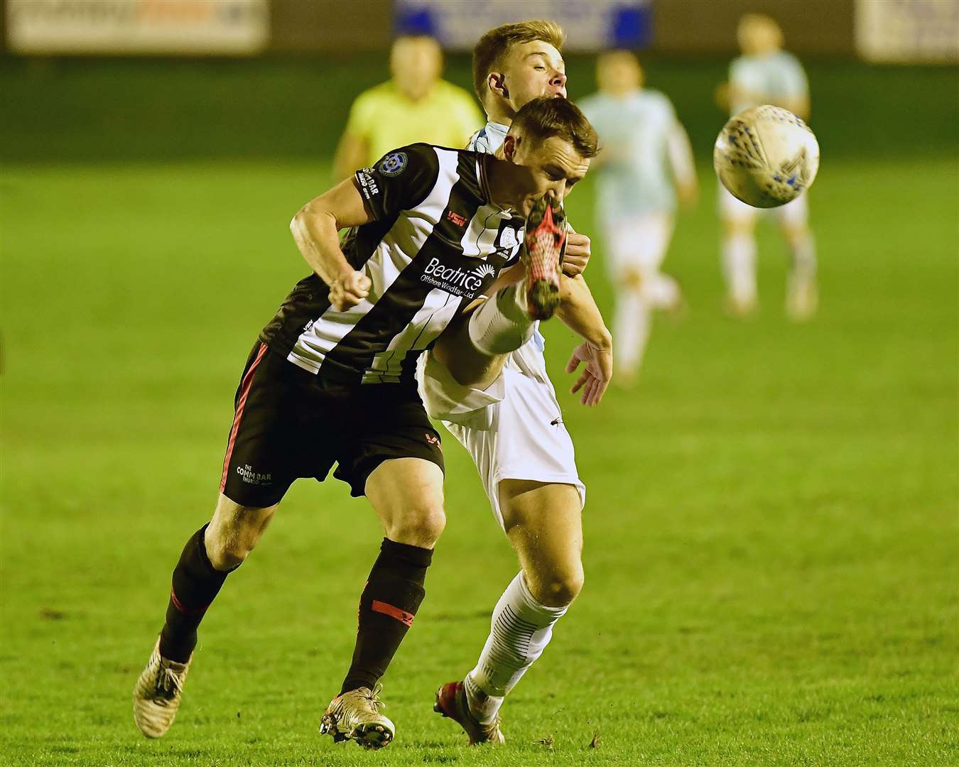 Wick Academy's Gary Manson gets his face acquainted with Andrew Hannar's boot during the defeat to Fraserburgh. Picture: Mel Roger