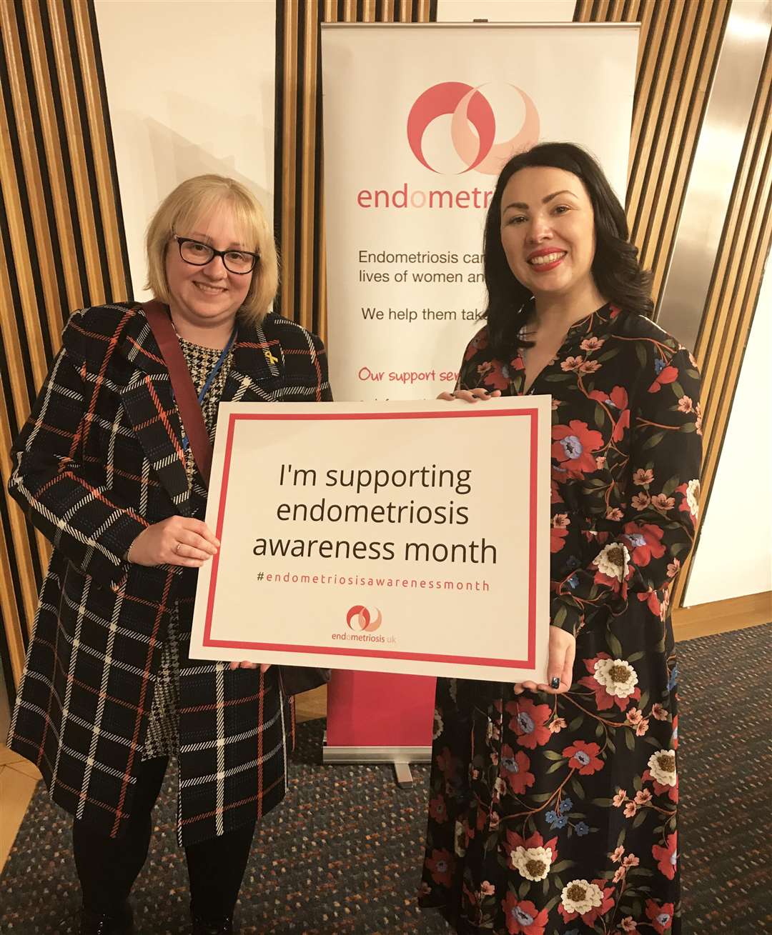 Kirsteen Campbell (left) with Labour MSP Monica Lennon in the Scottish Parliament at the start of last year's Endometriosis Awareness Month.
