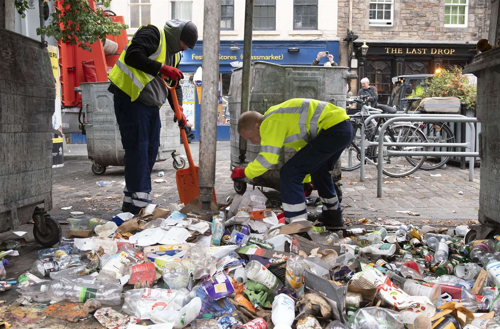 Clean-up work is now under way after the strike action left rubbish piled on the streets (Lesley Martin/PA)