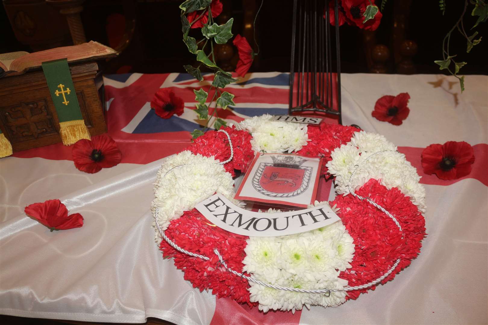 The HMS Exmouth wreath that was laid on the communion table in Wick St Fergus Church on Remembrance Sunday. Picture: Eswyl Fell