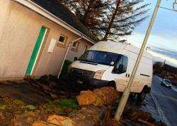 The newspaper delivery van which skidded off the road in the centre of the village, demolishing a wall and coming to rest at the side of the village football club pavilion. Photo: Marshall Bowman.