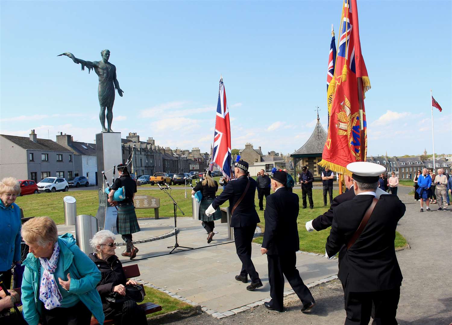 Standard-bearers marching to the Seafarers Memorial for the start of the service. Picture: Alan Hendry