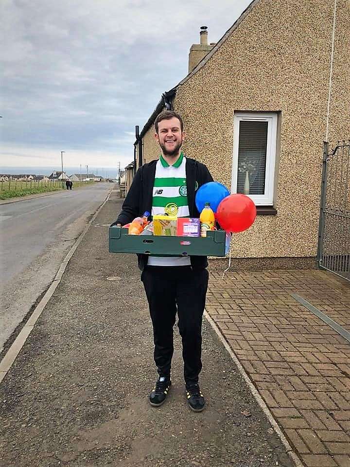 BT worker Ryan Watt delivers a box of goodies to Seaview House in Wick.