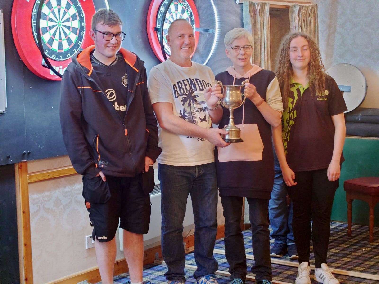 From left: Willie Keith Memorial Cup runner-up Ryan Campbell (Smiddy '2') and winner Willie Plank (Castletown Poachers), Karen Burke Memorial Trophy winner Freda Perry (Seaforth Ladies 'B') and the runner-up, Ryan's sister Sammy Campbell (Seaforth).