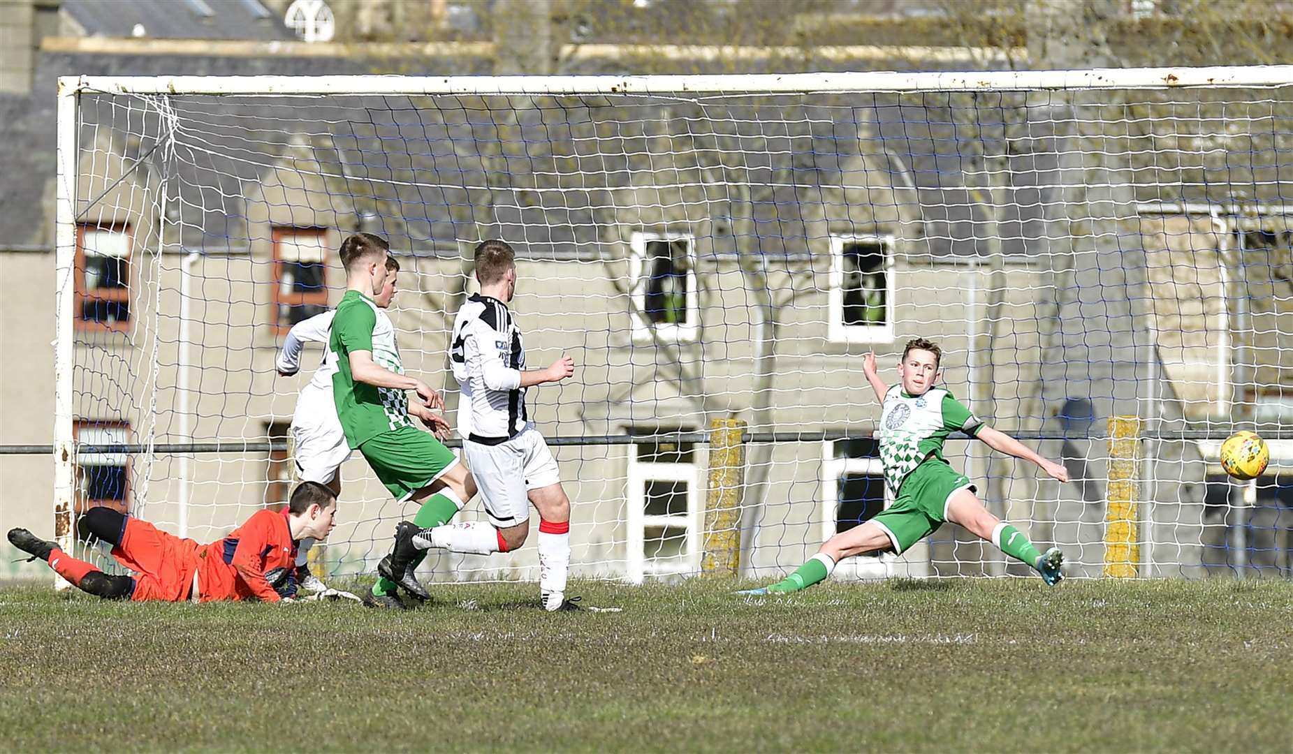 Sam Barclay opens the scoring for Wick Academy U17s against Buckie at the Upper Bignold. Picture: Mel Roger