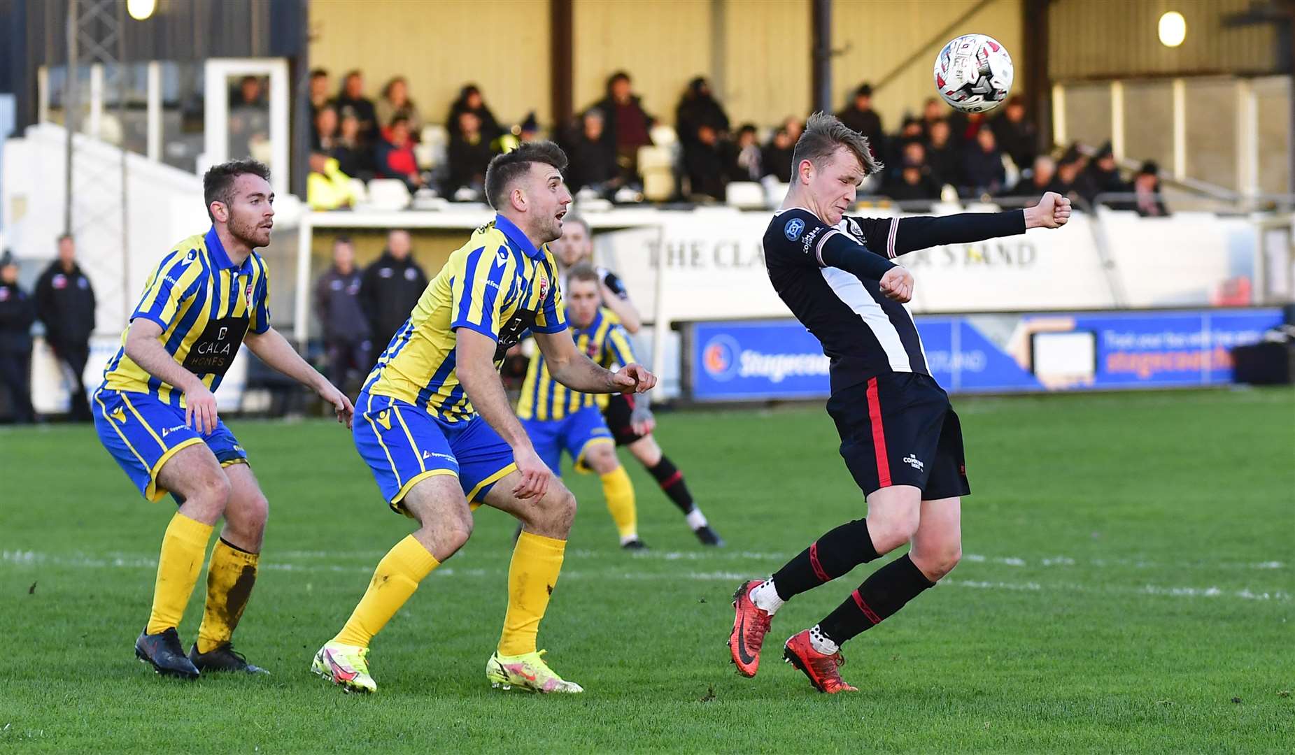 Wick Academy's Mark Macadie heads the ball clear during Saturday's defeat to Inverurie Locos. Macadie was one of five Academy teenagers to feature in the game. Picture: Mel Roger