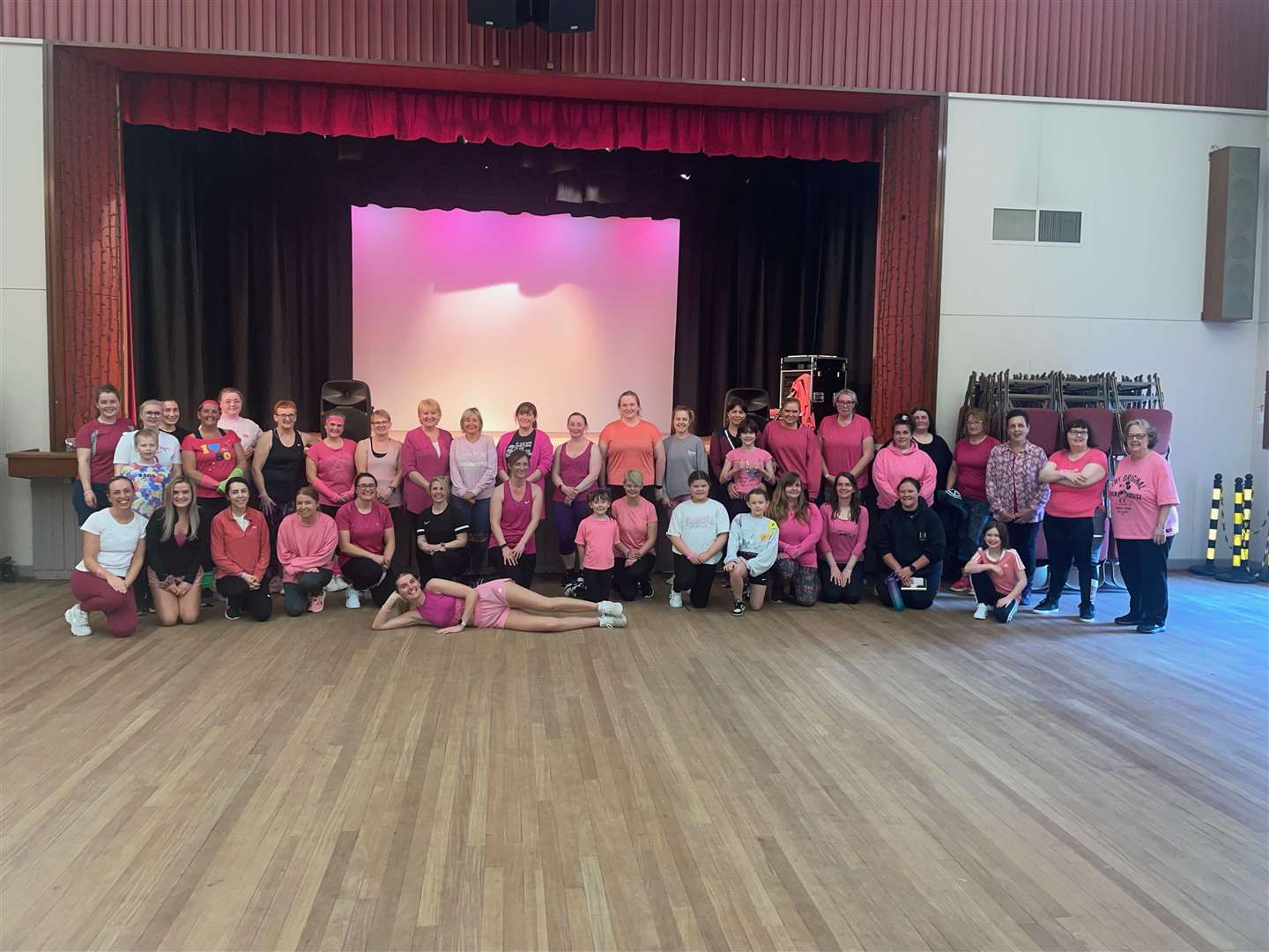 The zumba dance class in Wick raised over £500 for the breast cancer charity. Stephanie is on the floor at the front of the group.
