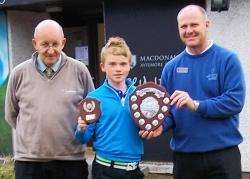 Euan is presented with his trophy by Spey Valley professional Murray Urquhart. On the left is Willie MacKay, ClubGolf’s Highlands and Islands regional manager.
