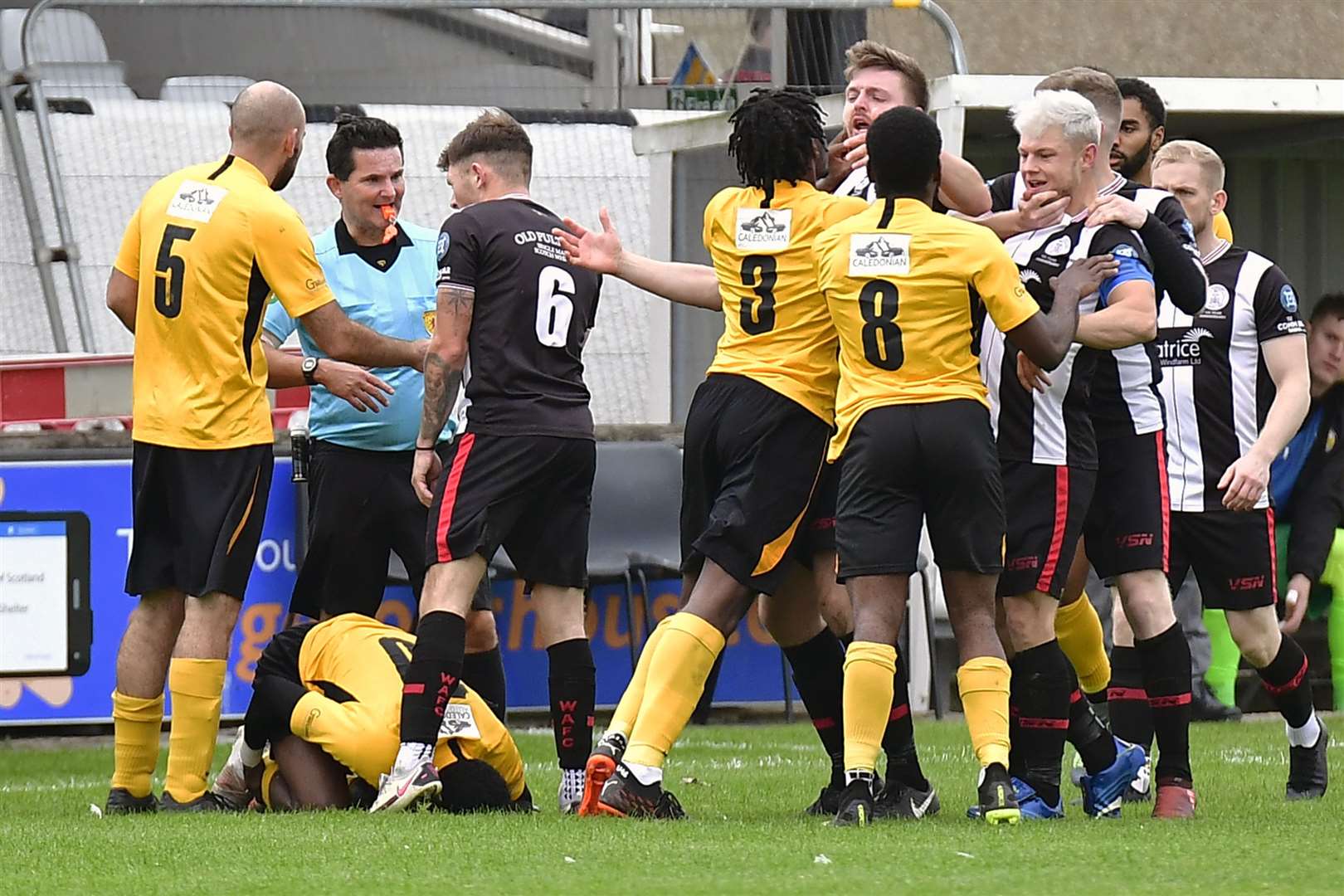 Tensions rise between Wick and Fort William players during the second half at Harmsworth Park. Picture: Mel Roger