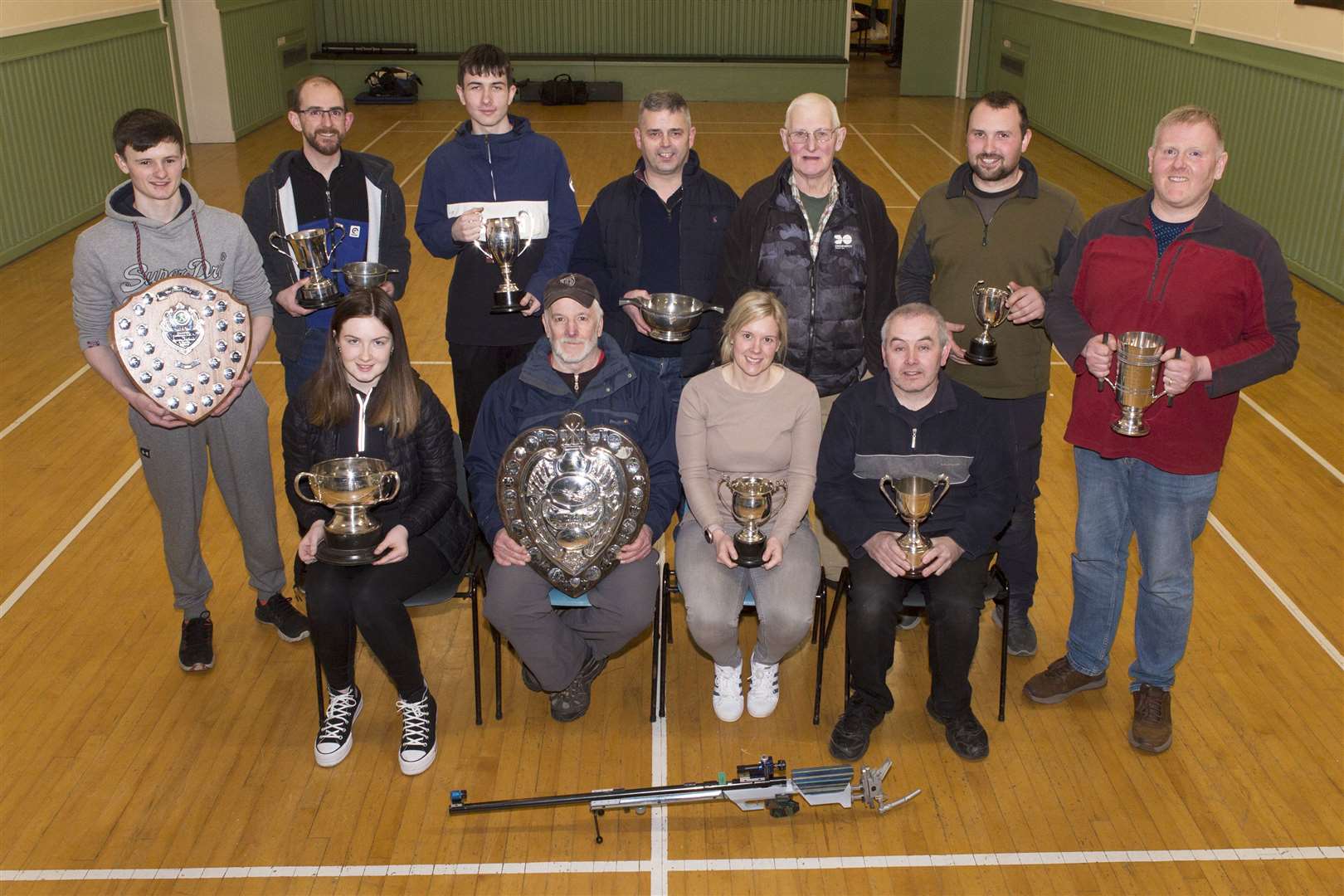 As the Caithness Small Bore Rifle Association indoor season drew to a close, league and team trophies were presented in Watten hall on Saturday night following the St Clair Cup competition, which was won by Westfield. Association chairman Graham Mackay (right) is pictured with some of the other shooters who accepted trophies on behalf of their clubs and teams. Back (from left): David Thomson, Gregory Bremner, both Watten, Ross Sutherland, Gordie Levack, both Halkirk, James Manson, Mark Mackay, both Westfield. Front: Sophie Campbell, Halkirk, Brian Young, Wick Old Stagers, Lisa Macdonald, Westfield, and Stevie Nicolson, Wick Old Stagers. Picture: Robert MacDonald / Northern Studios