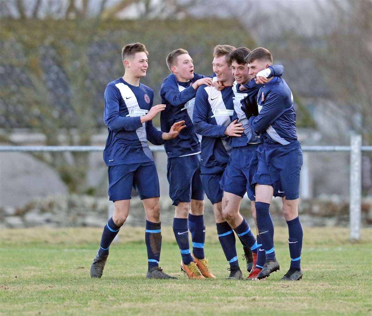 Kyle Henderson (second from right) is congratulated on scoring Halkirk United's equaliser in their 1-1 draw against Thurso by James Mackintosh, Korbyn Cameron, Aiden Reid and Ben Gordon. Picture: James Gunn