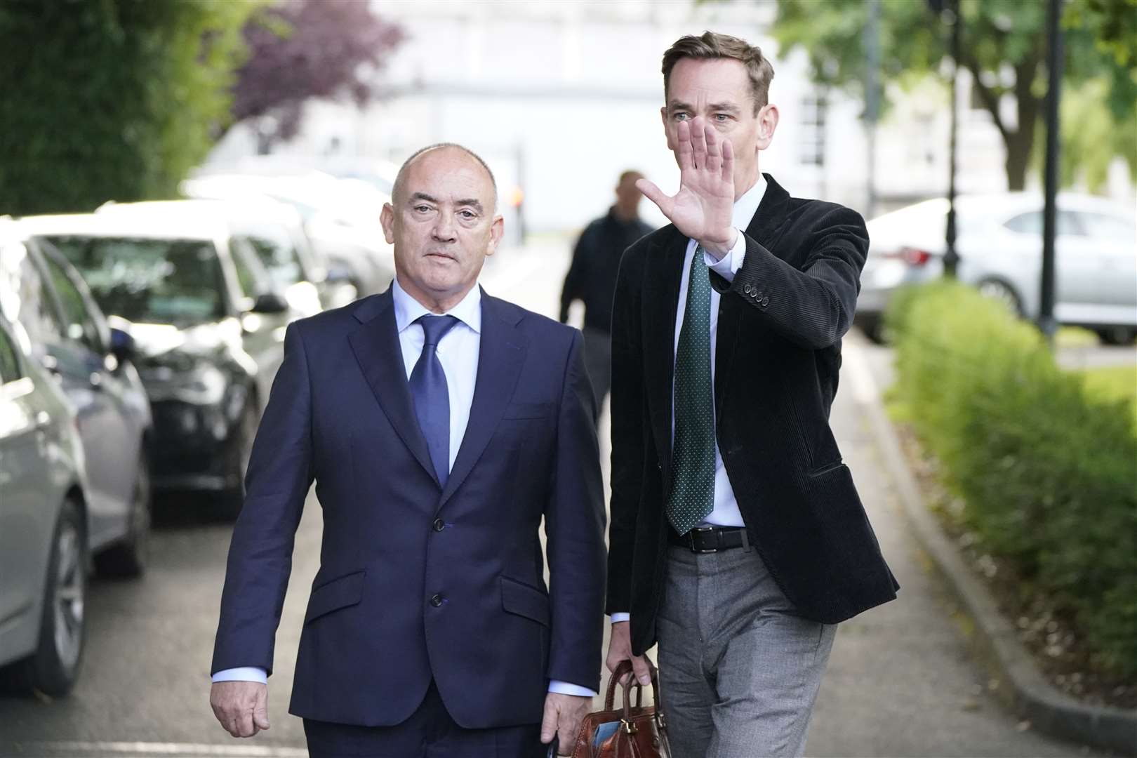 RTE’s highest-paid presenter Ryan Tubridy (right) with his agent Noel Kelly leaving Leinster House (Niall Carson/PA)