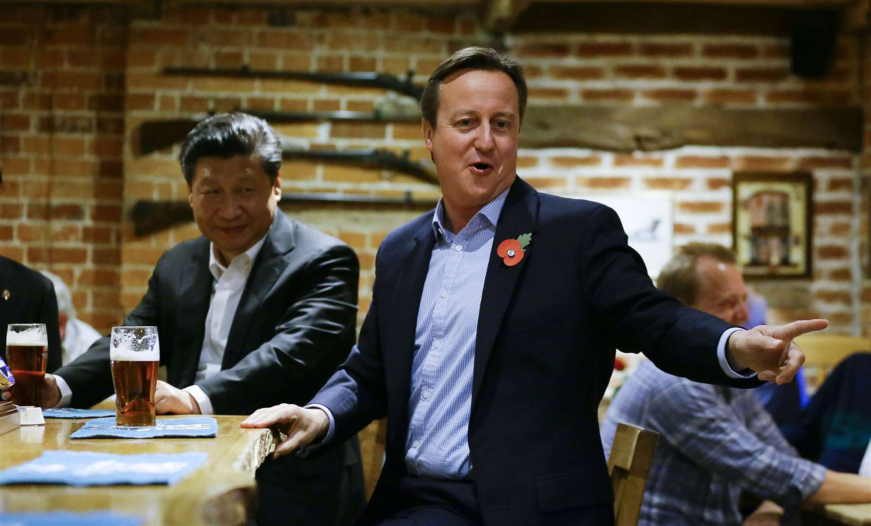 The UK’s relationship with China has changed dramatically since the 2015 pub trip (Kirsty Wigglesworth/PA)