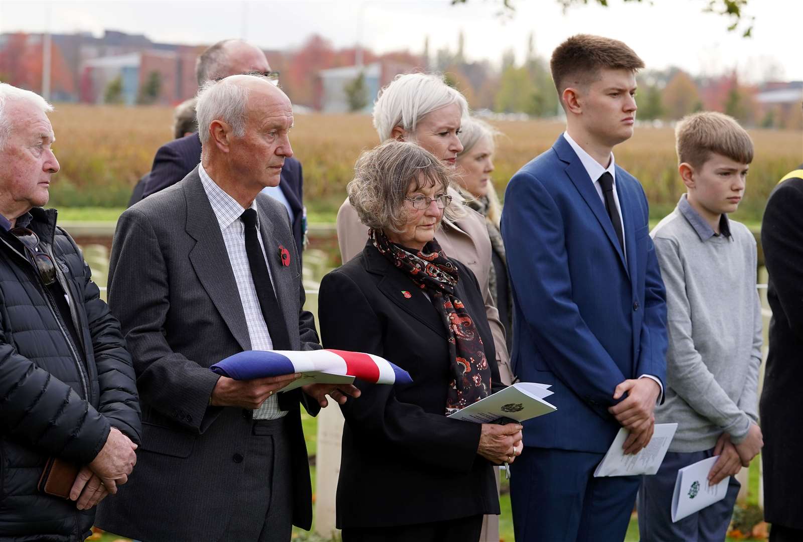 Family members watch as he is laid to rest (Gareth Fuller/PA)