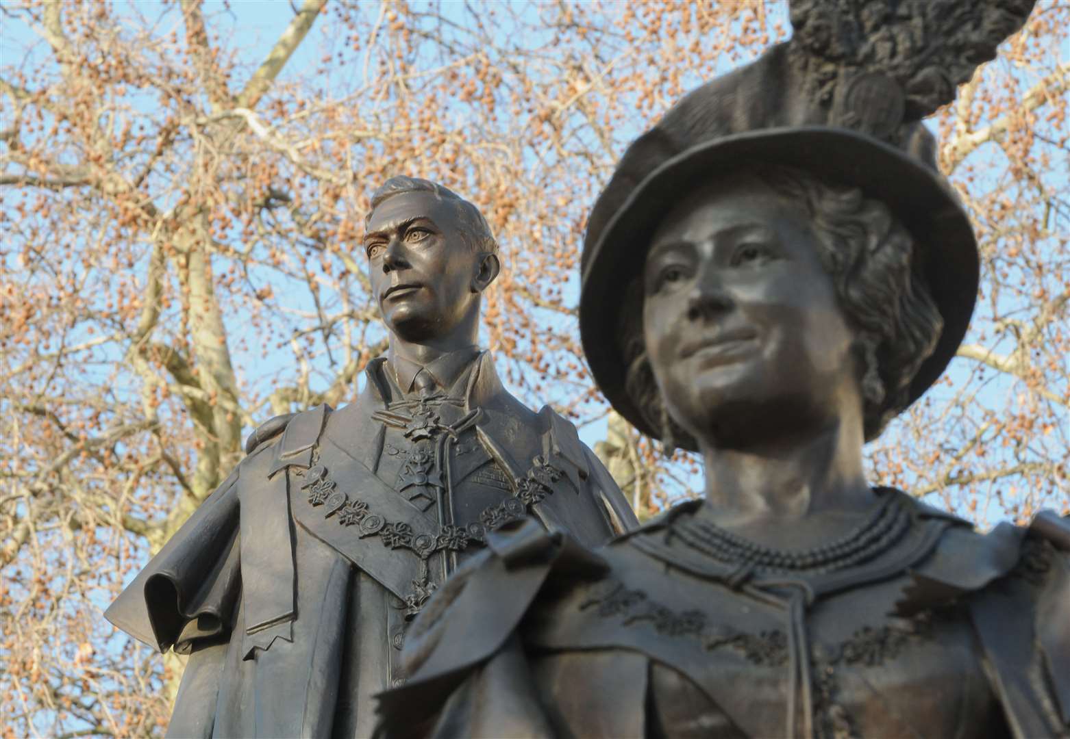 The statues of George VI and Elizabeth the Queen Mother on The Mall in central London (PA)