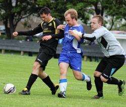 Acks’ Murray Mackintosh is caught in a sandwich between Staxigoe defender Colin Davidson and keeper Daniel Budge.