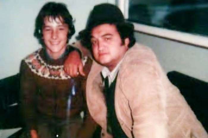 Colin Bruce, aged 15, at Wick Airport with Hollywood star John Belushi in 1980.