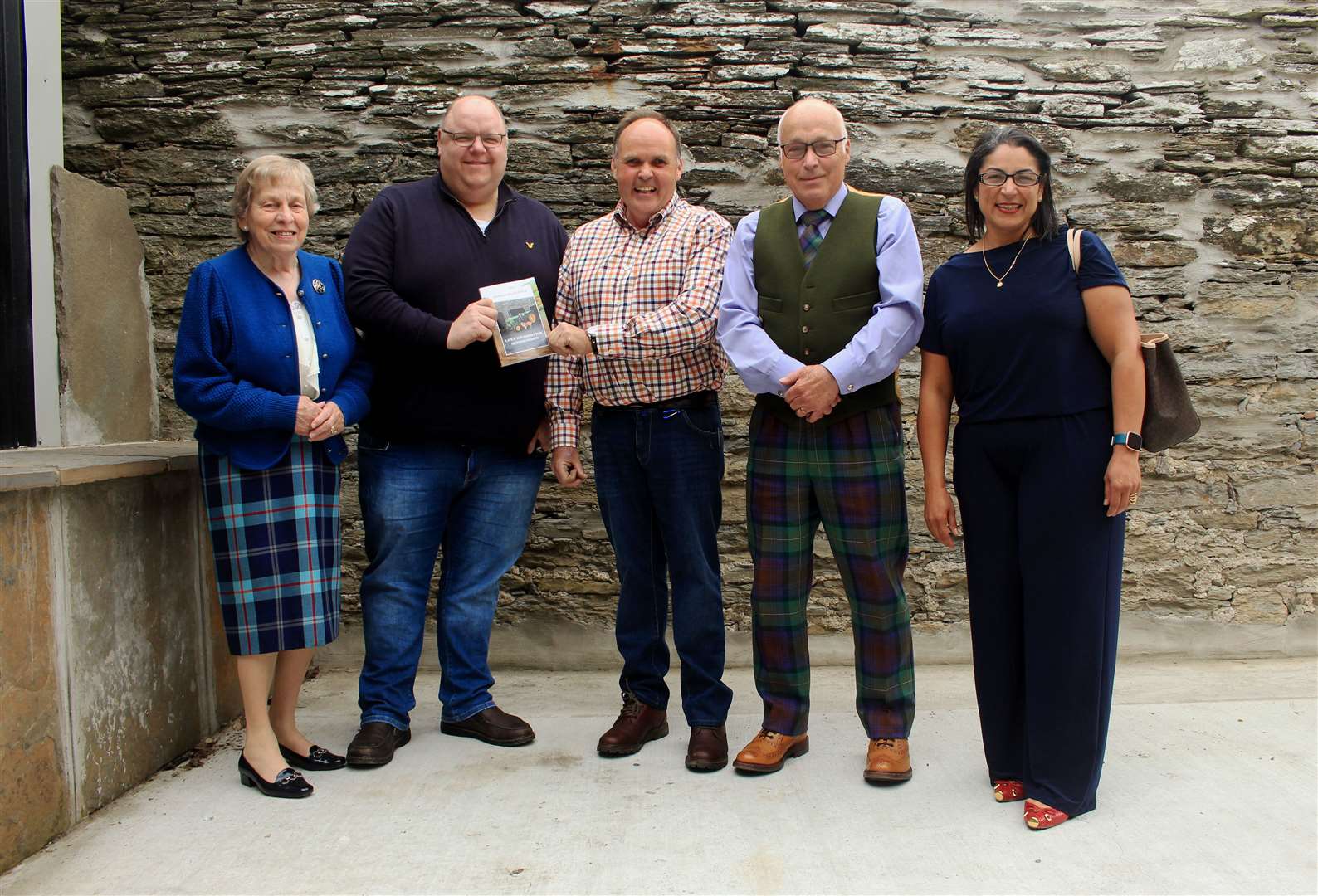 Donald MacDonald (centre) with (from left) Susan Somerset, Calum Adams, Peter Somerset and Elizangela Robertson at the book launch in Thurso at the weekend. Picture: Alan Hendry