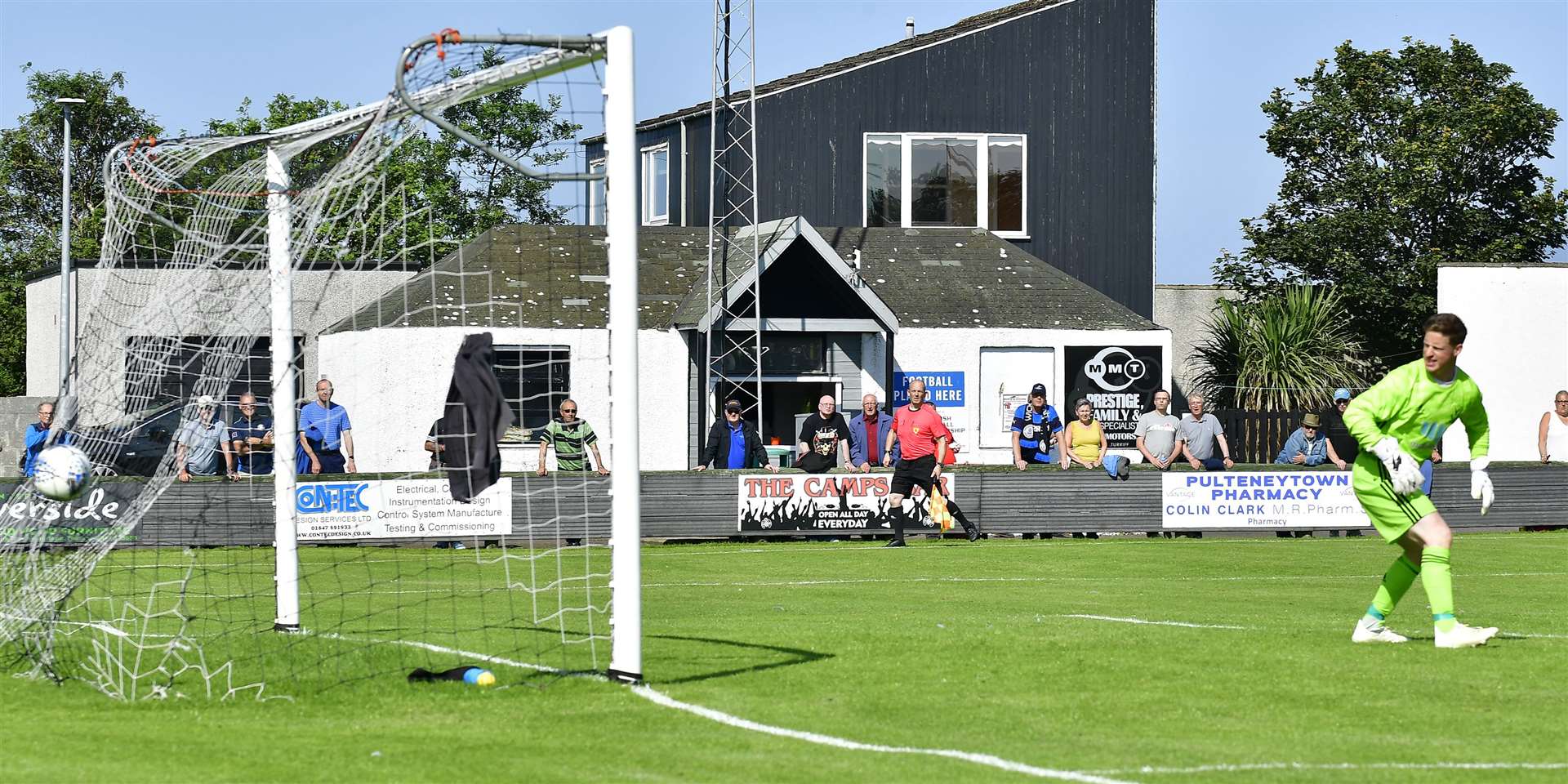 Deveronvale keeper Grant Pennet turns to see Craig Gunn's hitting back of the net as Academy go 2-1 up. Picture: Mel Roger