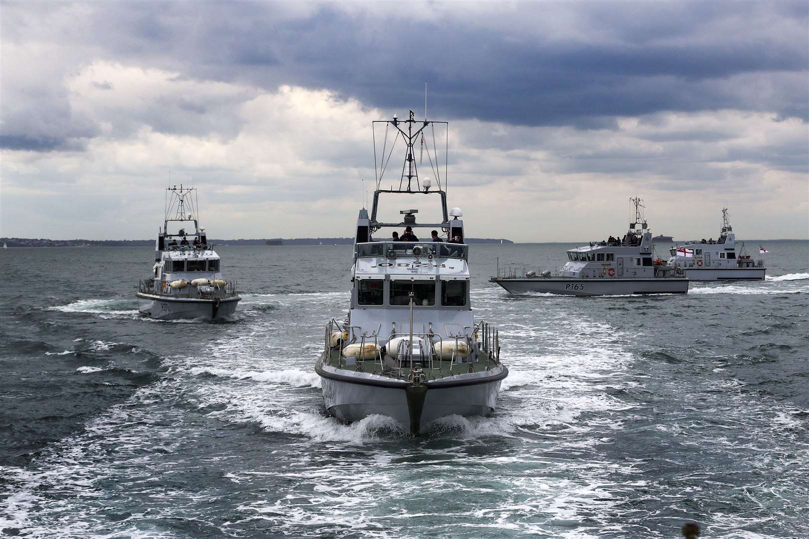 Four Archer class patrol vessels at sea.