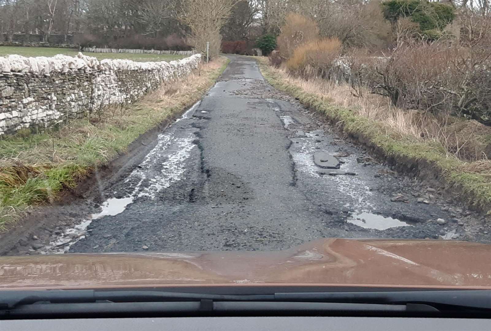 The two councillors say this road in the Castletown area ‘is so poor in parts it cannot safely be driven on in a conventional car’.