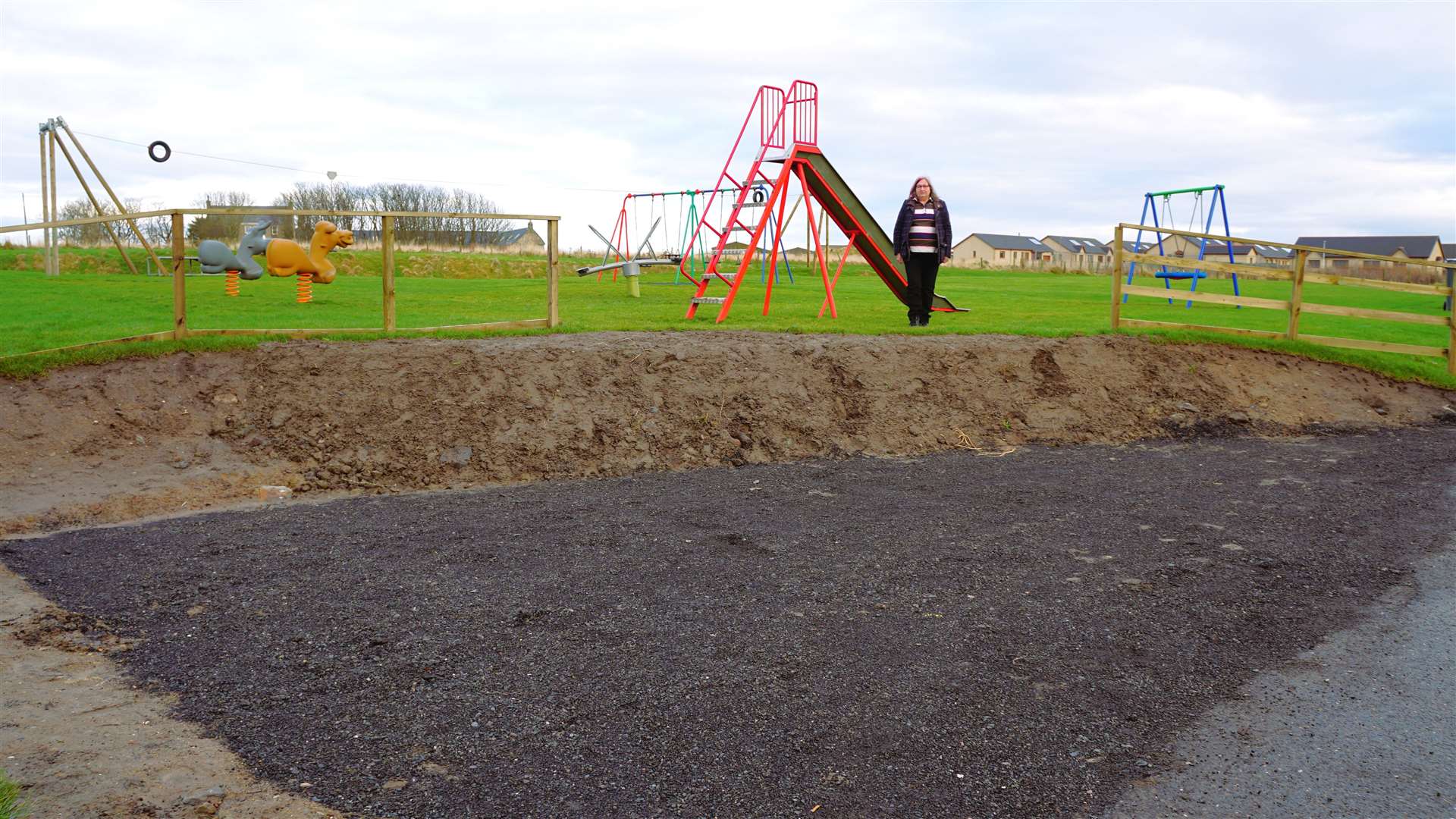 Councillor Jan McEwan believes the play slide is too close to the fence and should be erected elsewhere in the park. Picture: DGS