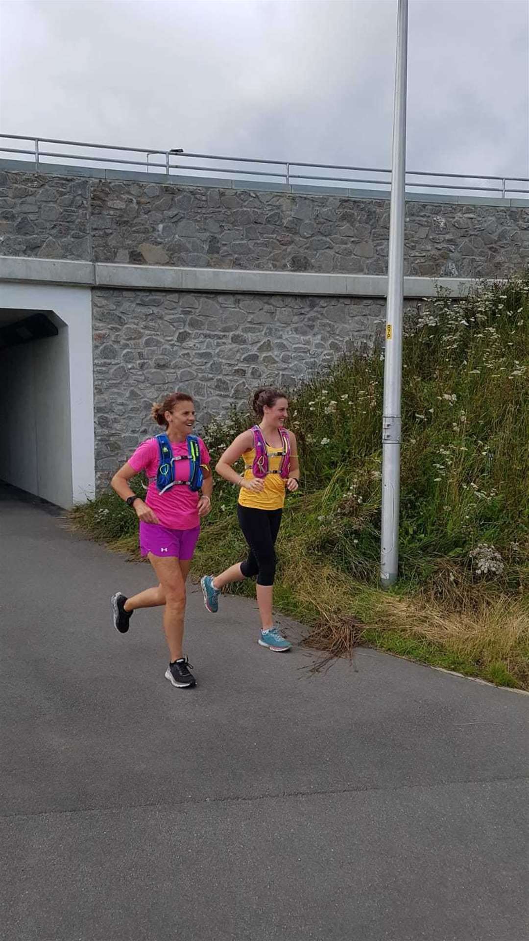 Sophie Dunnett, left, and daughter Oonagh race onwards to completion of the the Great Glen Way Challenge.