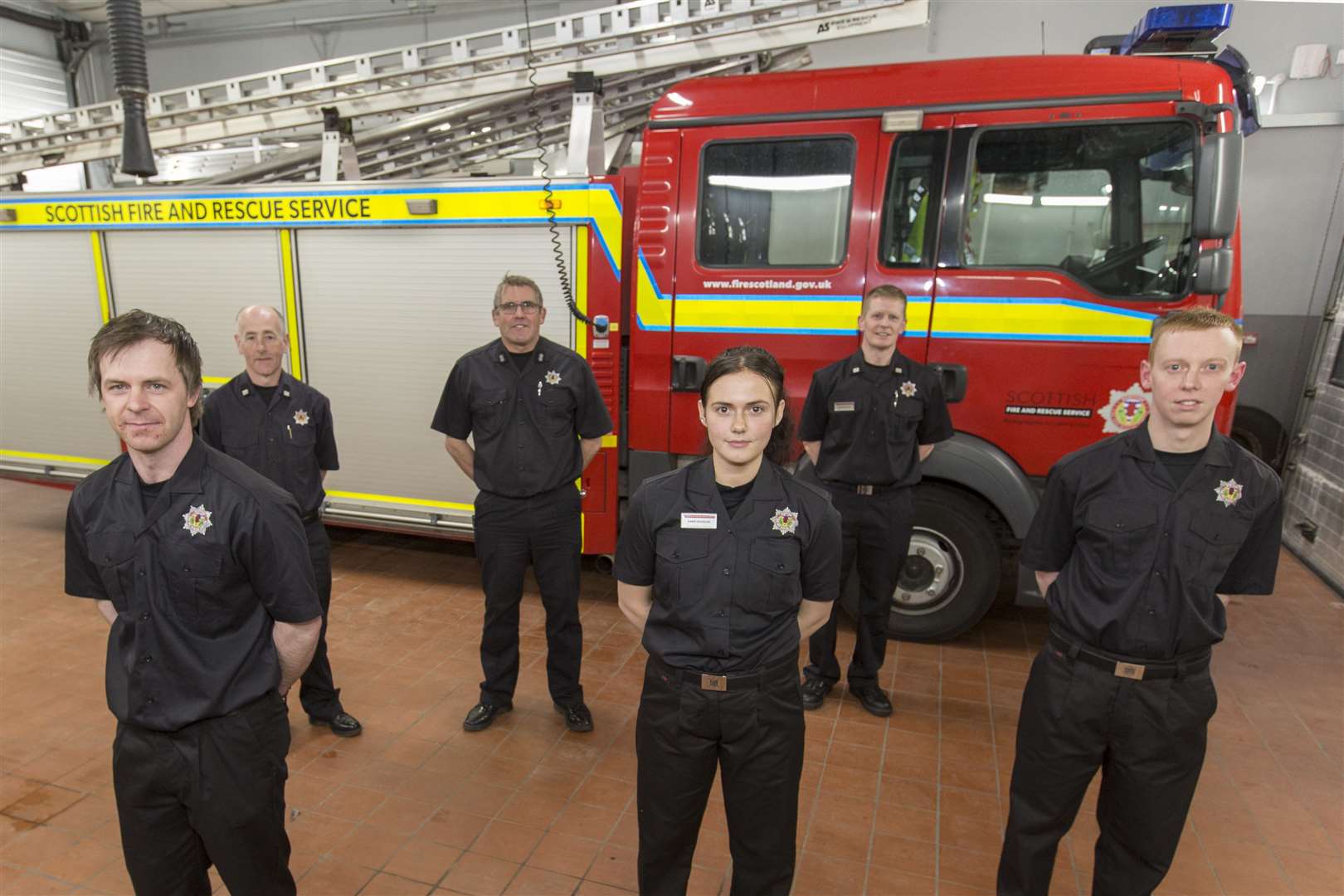 Abbie Douglas, along with her fellow new recruits, Graeme Sinclair (left), and Sean Stewart, pictured with watch commander Colin Gunn (back centre), and crew commanders Hugo Ross (back left), and Graeme Miller, (back right). Picture: Robert Macdonald/Northern Studios.