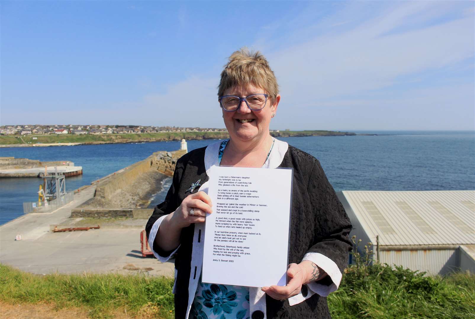 Jenny Szyfelbain holding the poem she read out during Sunday’s event. Picture: Alan Hendry