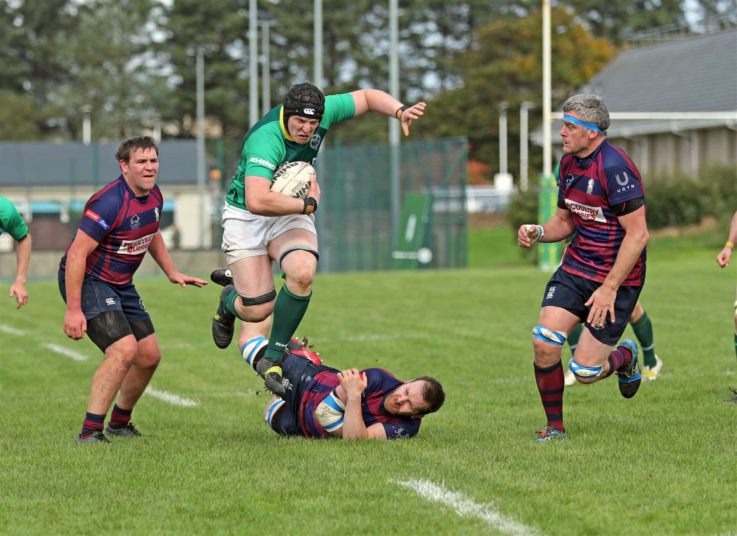 Caithness won 27-12 when Hillfoots visited Millbank last month. Here, Kevin Budge jumps through a tackle as he heads for the try line. Picture: James Gunn