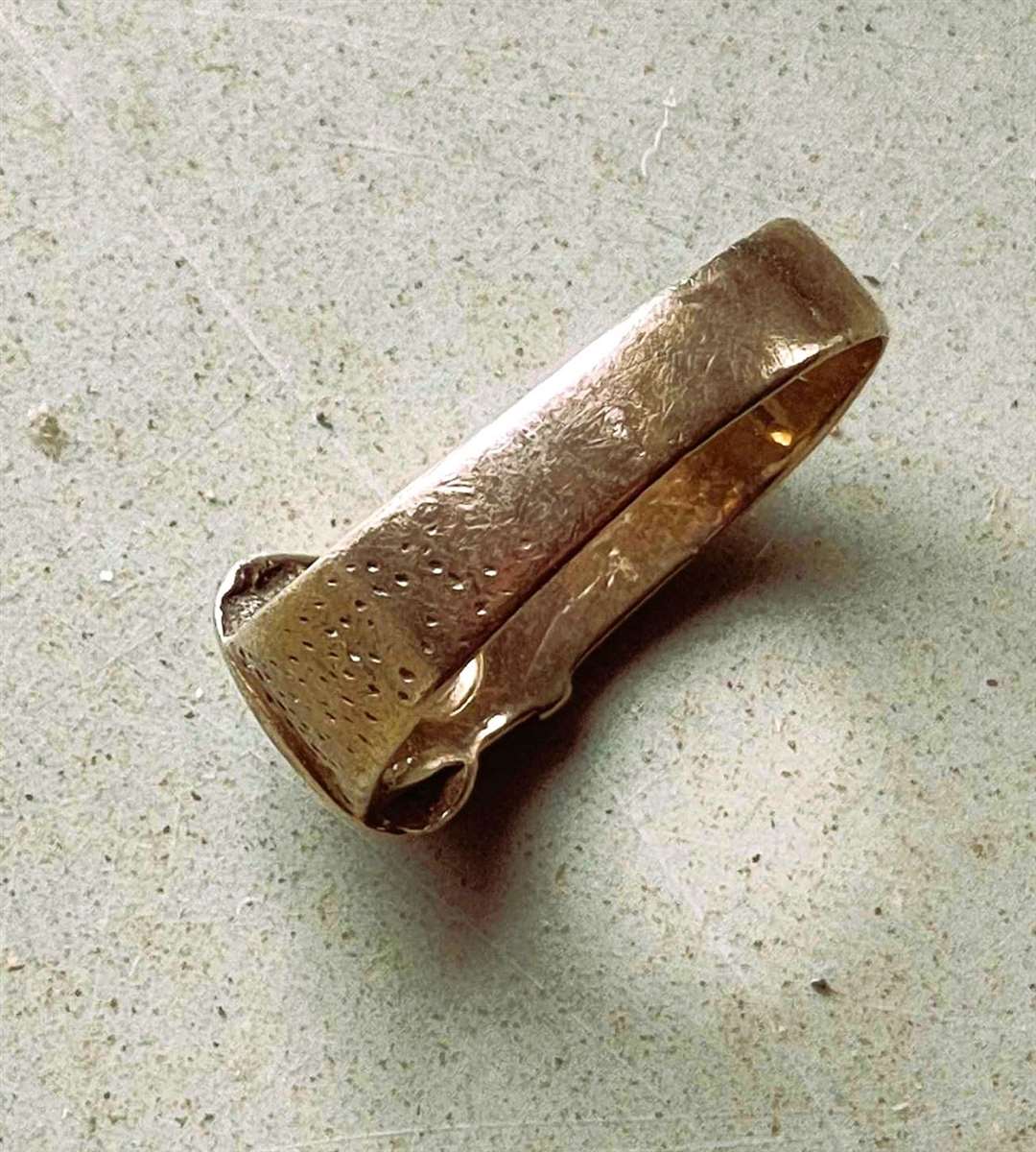 The ring found in a bag of kindling wood at Dunnet forest. A feature of the ring is hidden in the photograph and the rightful owner would know what that is.