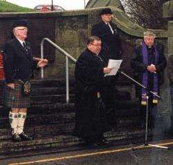 Father John Allen (right) at Sunday’s Remembrance Day service in Wick. Photo J. McDonald