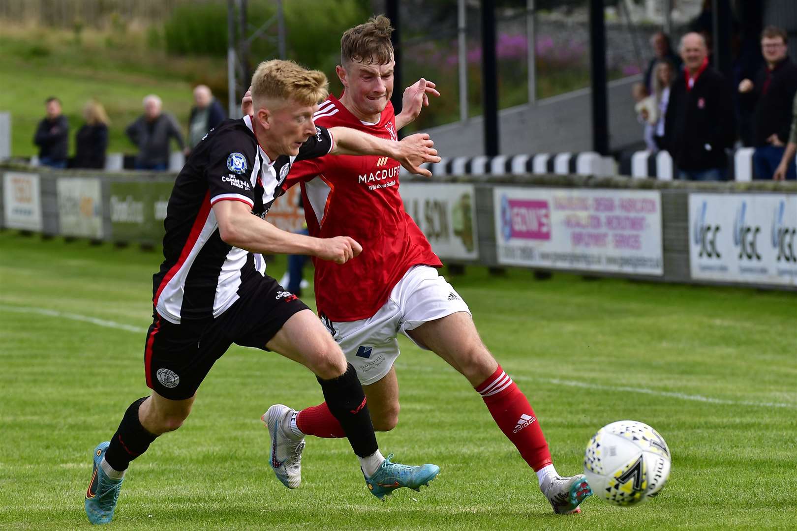 Wick Academy's Ross Gunn and Deveronvale's Scott Thomson during the 2-2 draw at Harmsworth Park in August. Picture: Mel Roger