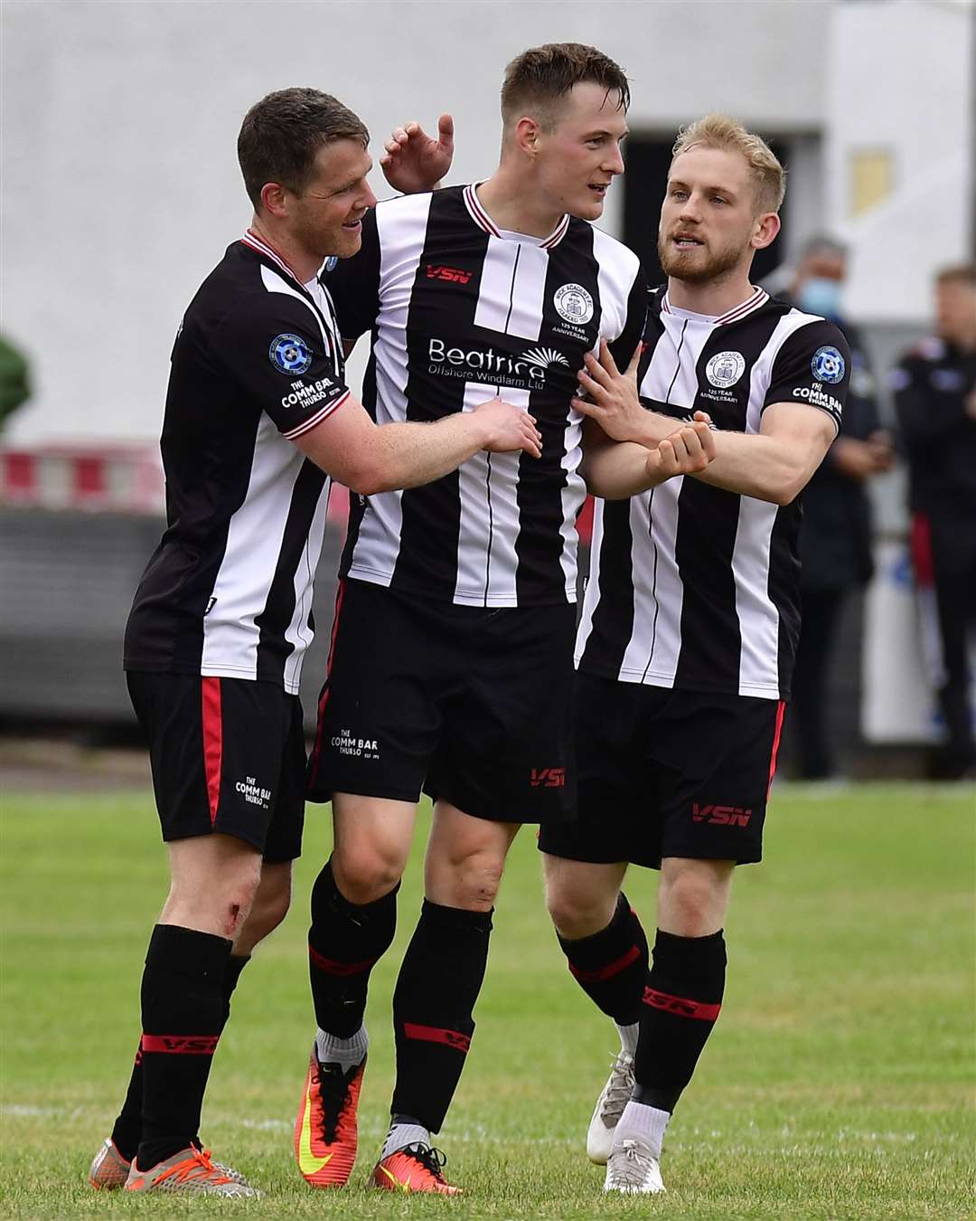 Steven Anderson (centre) takes the acclaim of Davie Allan and Alan Hughes after his first goal since returning to Wick Academy. Picture: Mel Roger