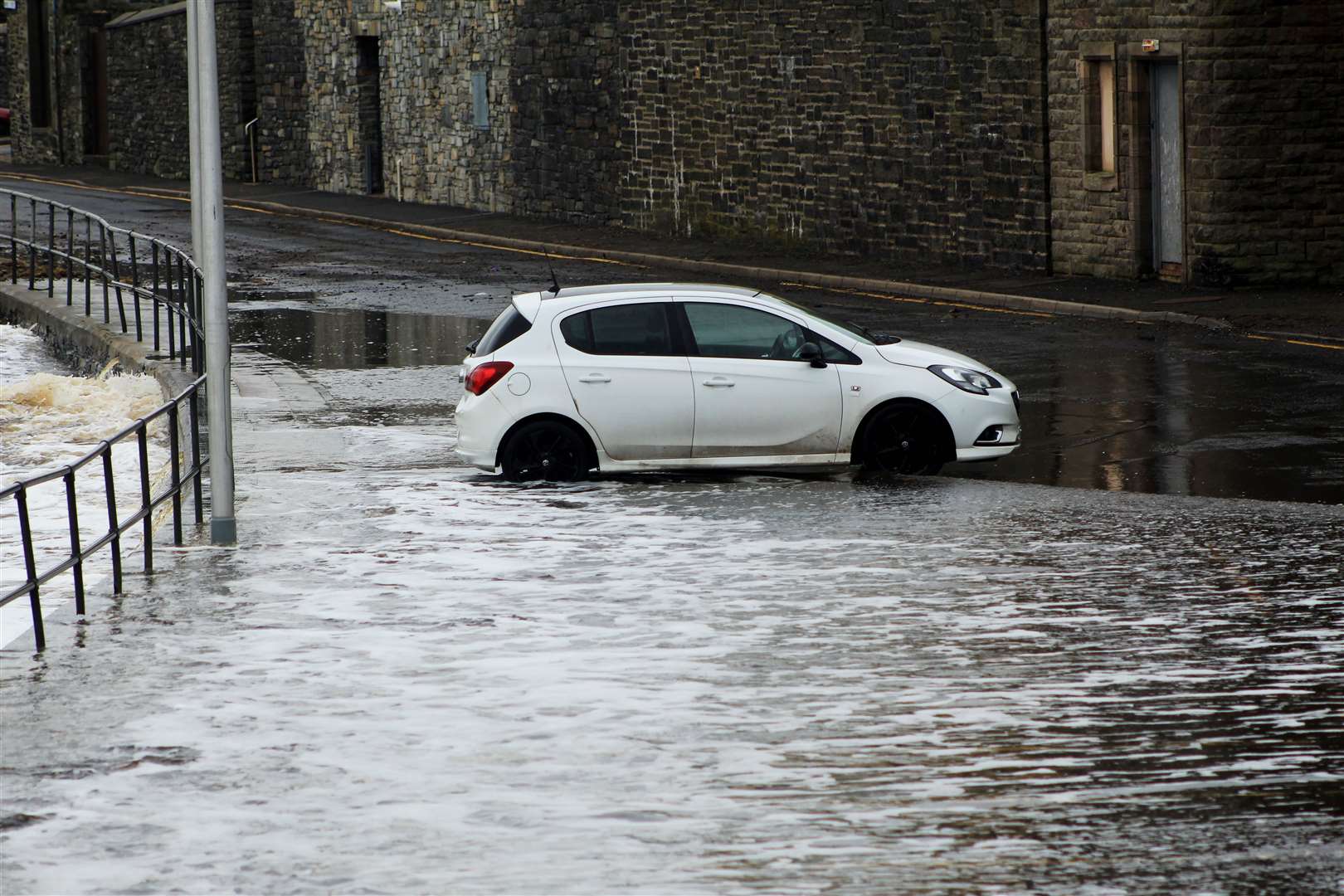 Partial flooding along Market Street in Wick on Sunday. Picture: Alan Hendry
