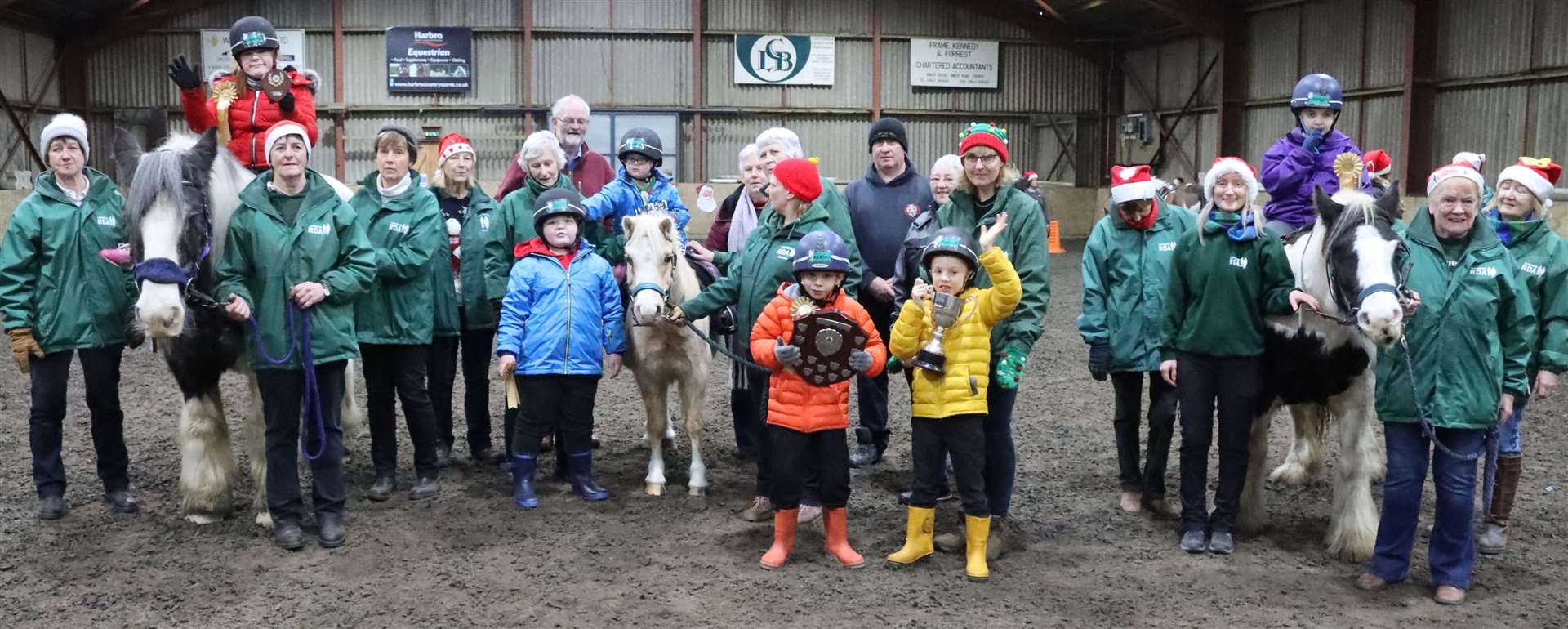 This time it's the turn of Ride 2 to face the camera for a photo along with their coach Erin Russell and helpers. The trophies and rosettes were presented by Audrey Macdonald, Alistair and Lorna Swanson, and Colin Forsyth from Team MCC. Picture: Neil Buchan