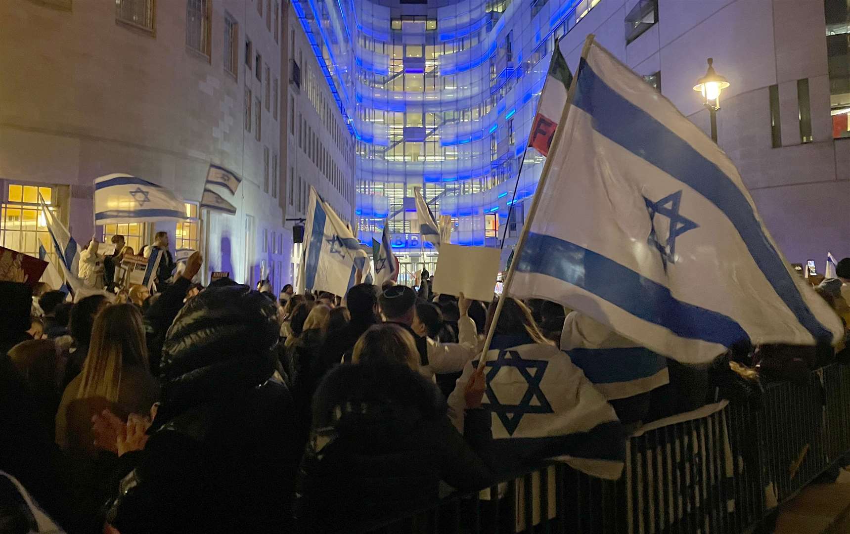 Israel flags were waved outside the BBC entrance in Portland Place (Jacob Phillips/PA)