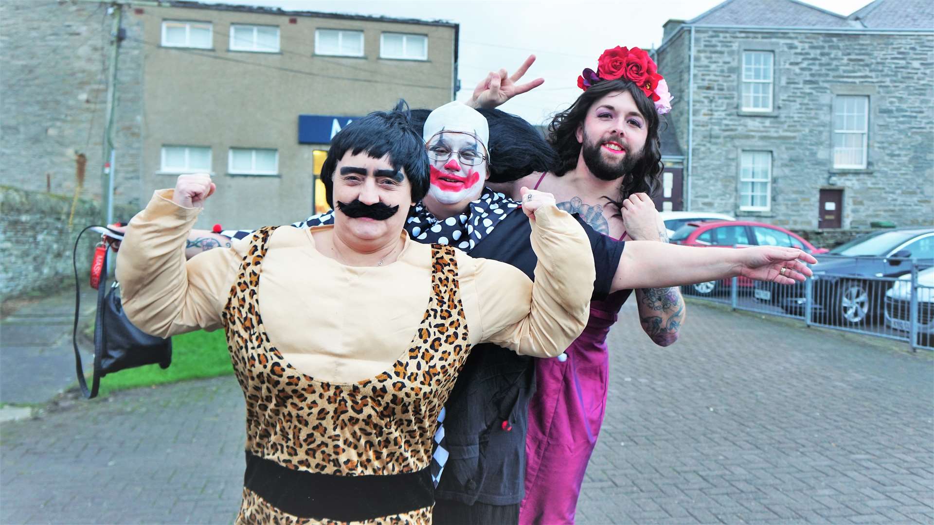 From left, staff from Jamieson's Bakery on Rotterdam Street took to the street to spread the festive fun. The strong man is Linda Macgregor, the clown is Susan Easson and the bearded lady is Ryan Jamieson who together with other staff members won first prize for best costumes of the day. Picture: DGS