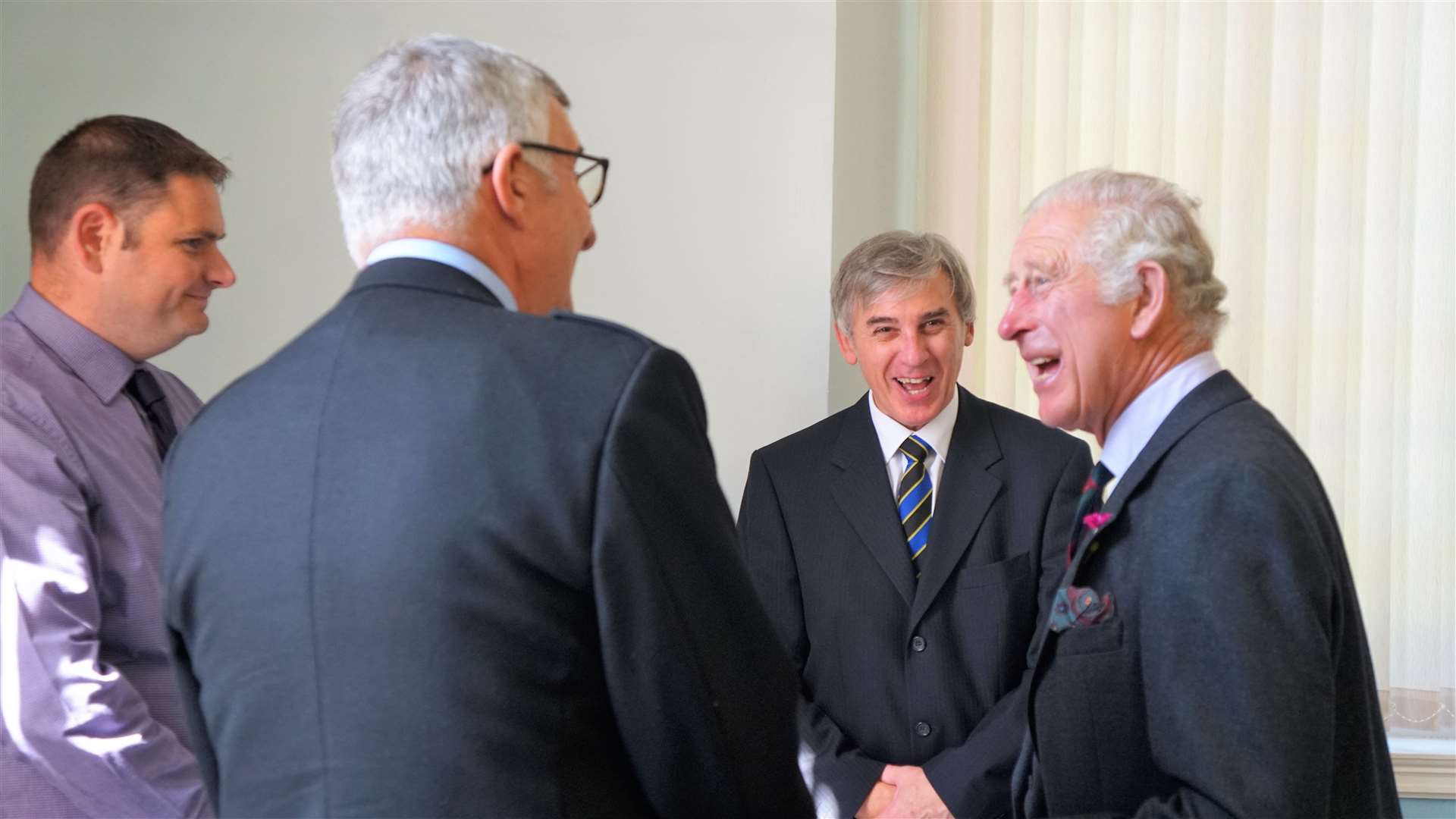 HRH meets members of the Royal Burgh of Wick Community Council and shares a laugh. Picture: DGS