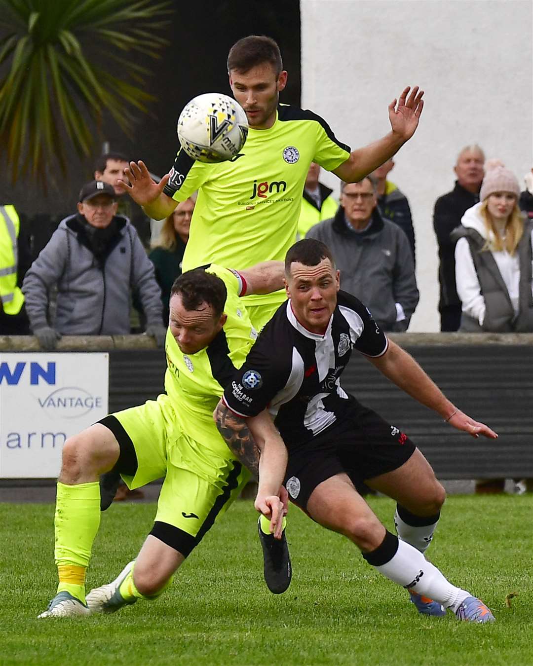 Wick Academy's Gordon MacNab and Jeanfield Swifts' Aaron Whitehead. Picture: Mel Roger