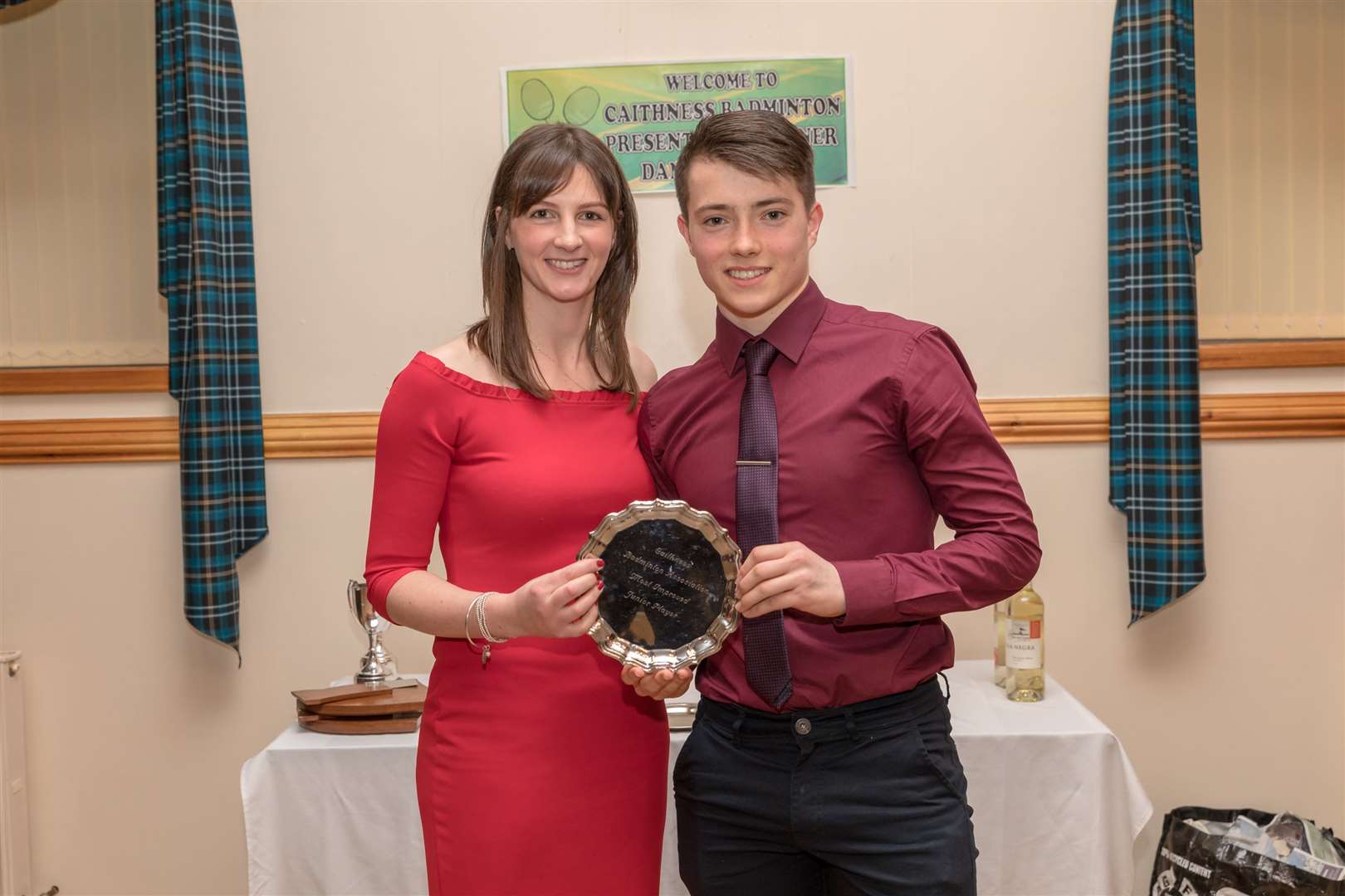 Mark McCoustra, Thurso, receiving his award for most improved junior player from Shona Mackay, president of Caithness Badminton Association. Picture: Duncan McLachlan
