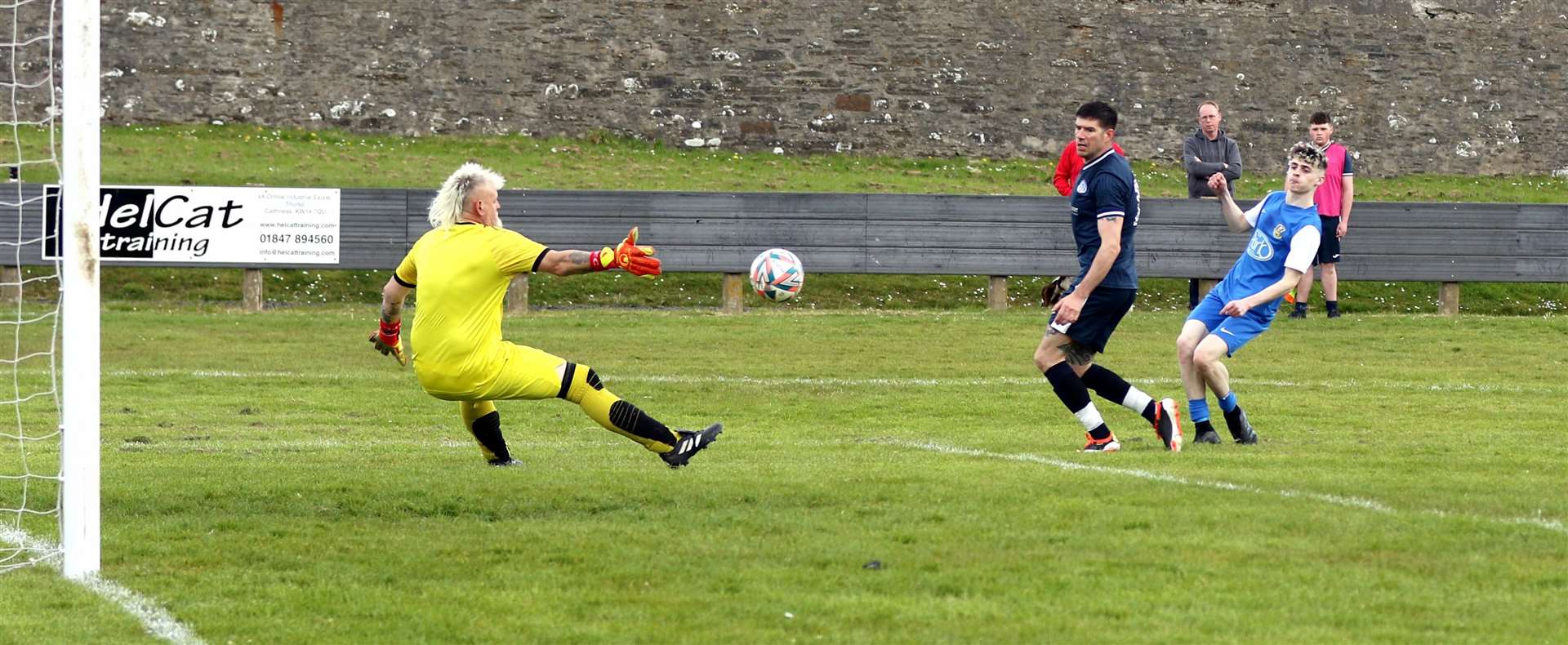 Harvey Labor watches his shot beat Lochinver goalkeeper Alan Elder for Acks' first equaliser. Picture: James Gunn