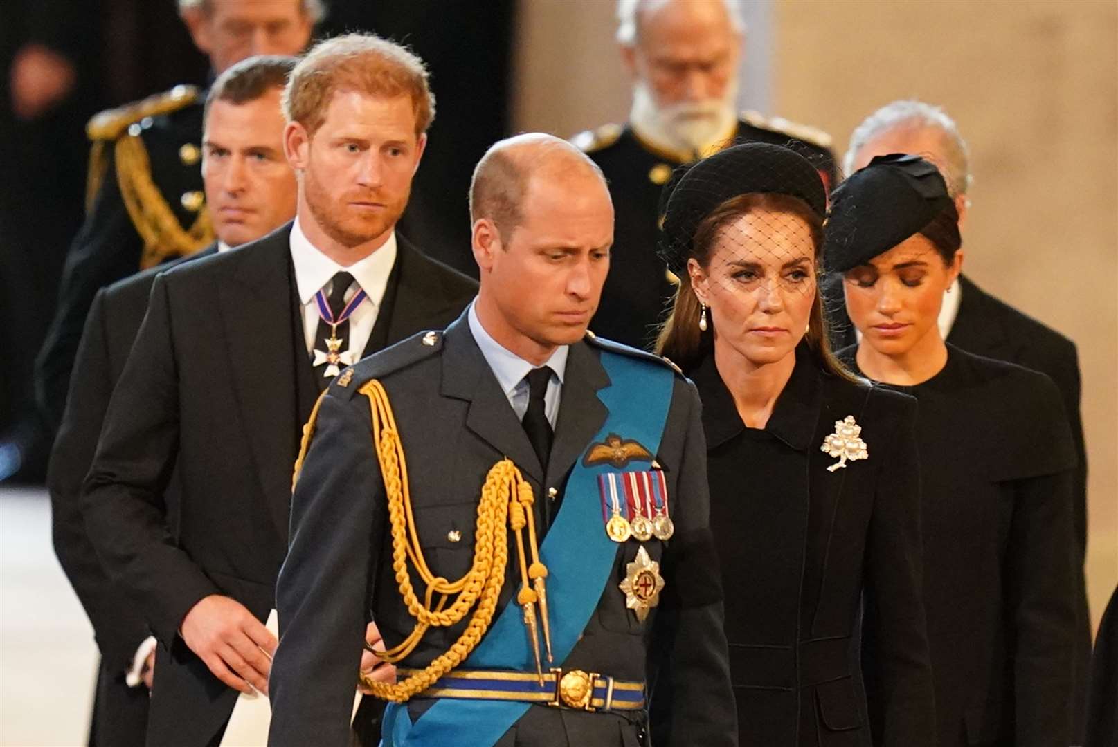 The Duke of Sussex, the then Prince and Princess of Wales and the Duchess of Sussex, following the bearer party carrying the coffin of Queen Elizabeth II (Jacob King/PA)