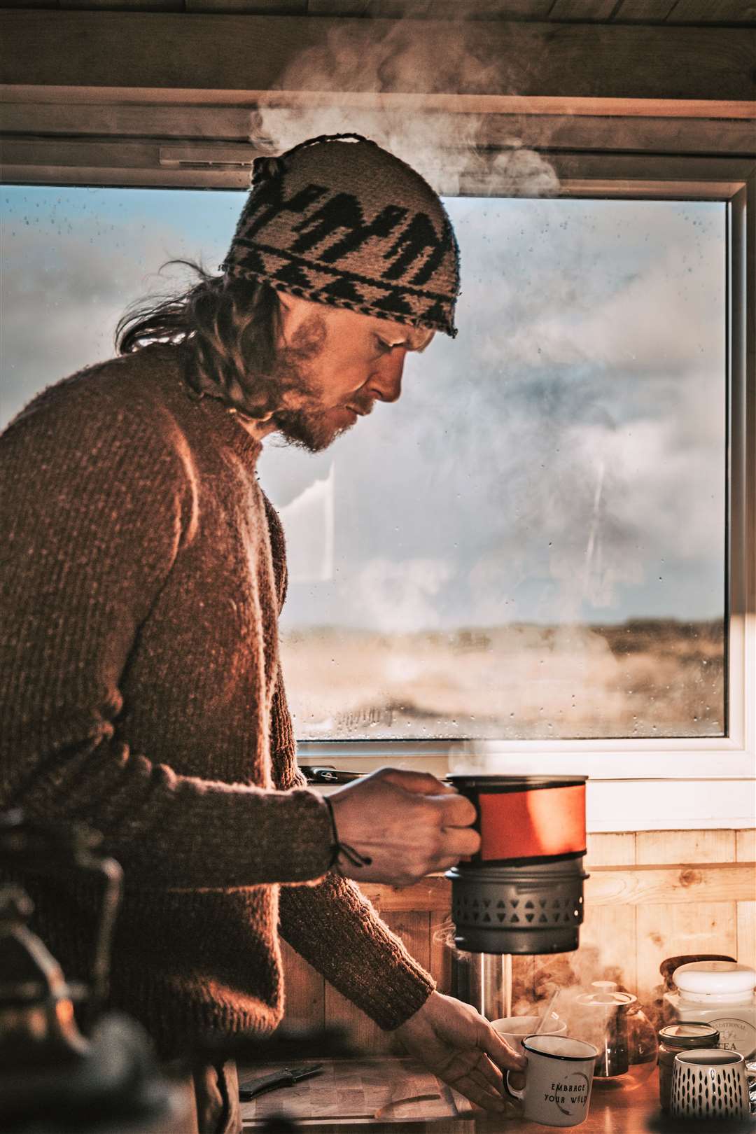 Chaz Powell making a cuppa in his cabin and preparing to begin walking. Picture: Katie Taylor