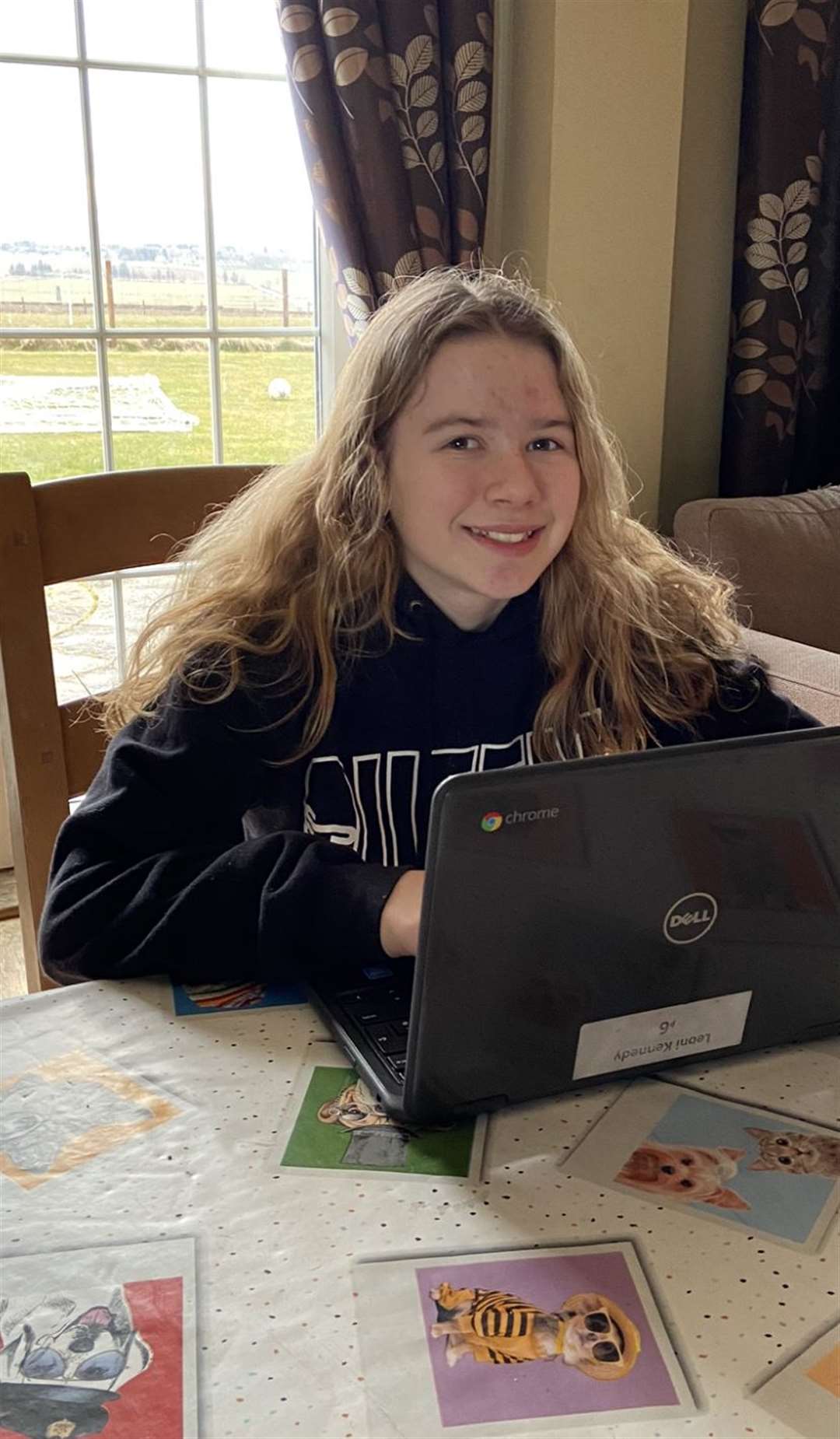 Halkirk Primary School P6 pupil Leoni Kennedy (11) settles down to her work at home with her Chromebook.