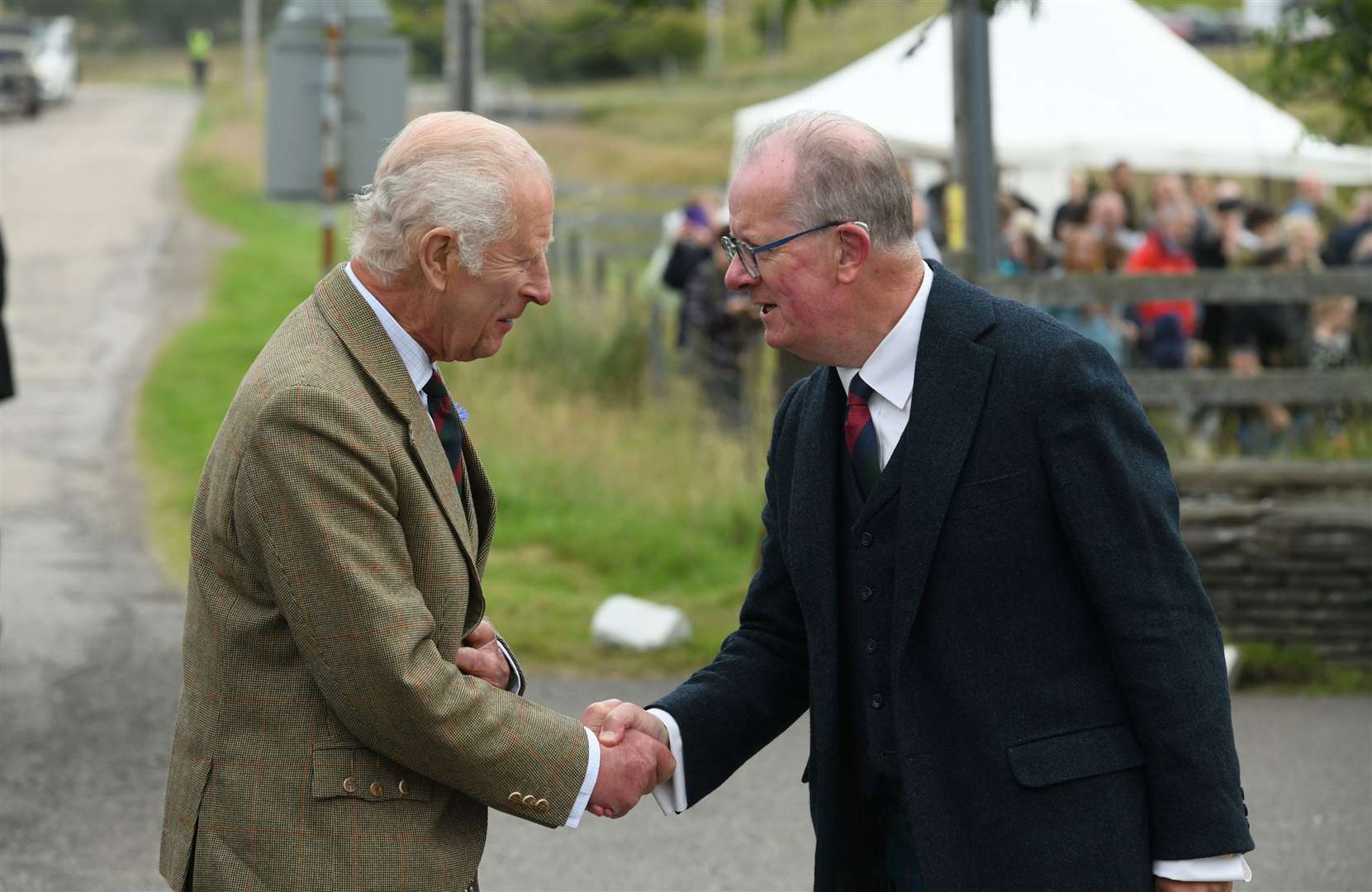 His Majesty King Charles is greeted by Major General Patrick Marriott. Picture: James Mackenzie