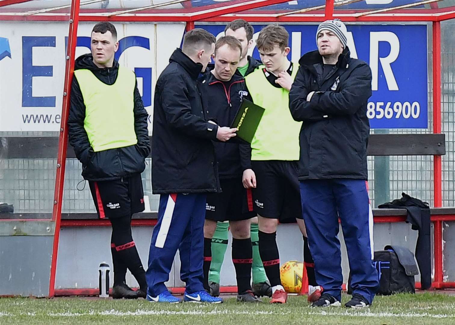 Academy co-managers Gary Manson and Stewart Ross discuss tactics with substitutes Richard and Mark Macadie at Dudgeon Park. Picture: Mel Roger