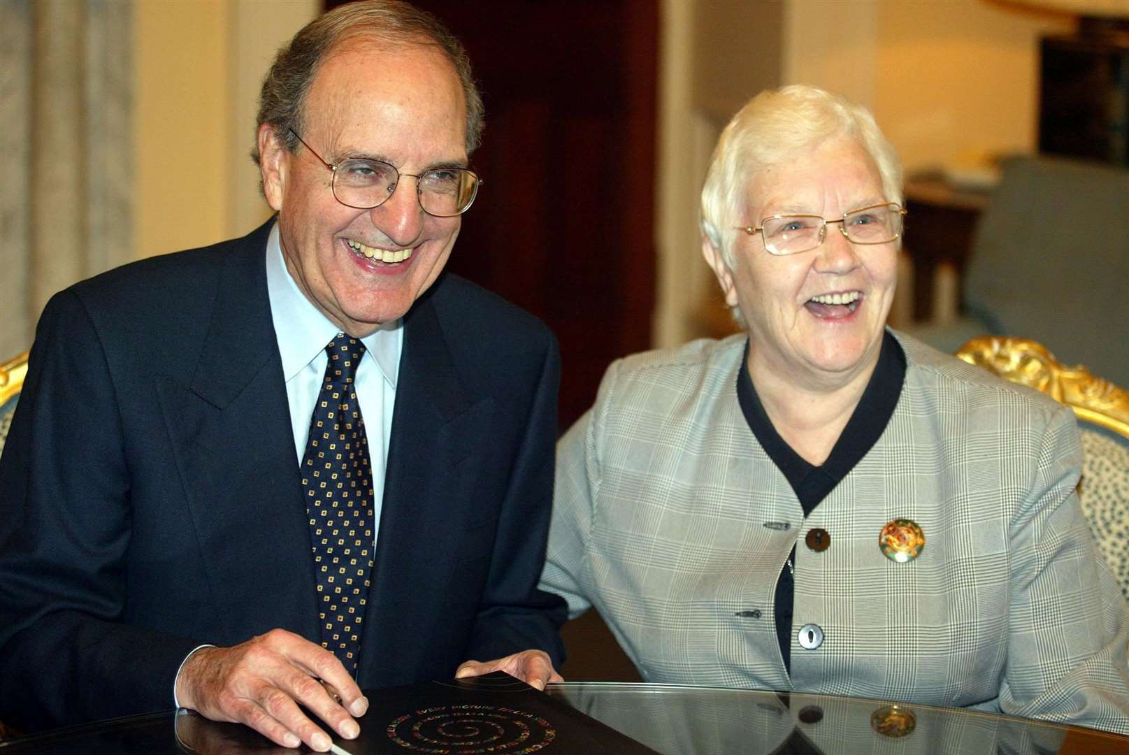 US Senator George Mitchell with Baroness May Blood in Belfast (Paul Faith/PA)